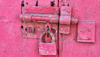 red metal padlock